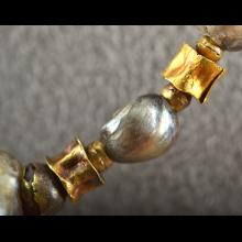Collier de fouilles en or et perles fines
